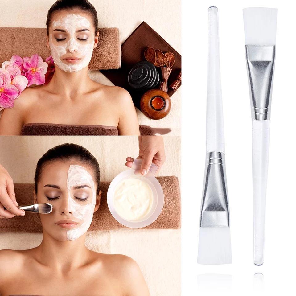 Professional makeup brushes for facial mask application and skincare.