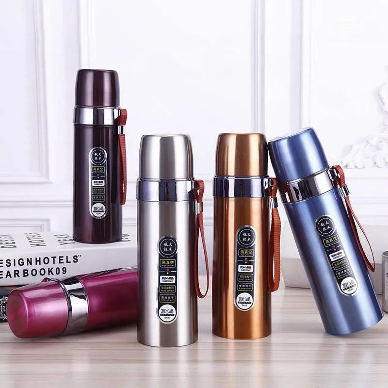 Stylish vacuum flasks and water bottles in metallic colors.