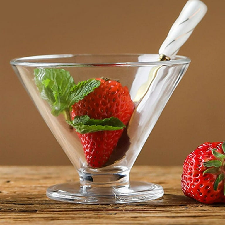 Elegant glass cup with strawberries and mint for desserts or salads.