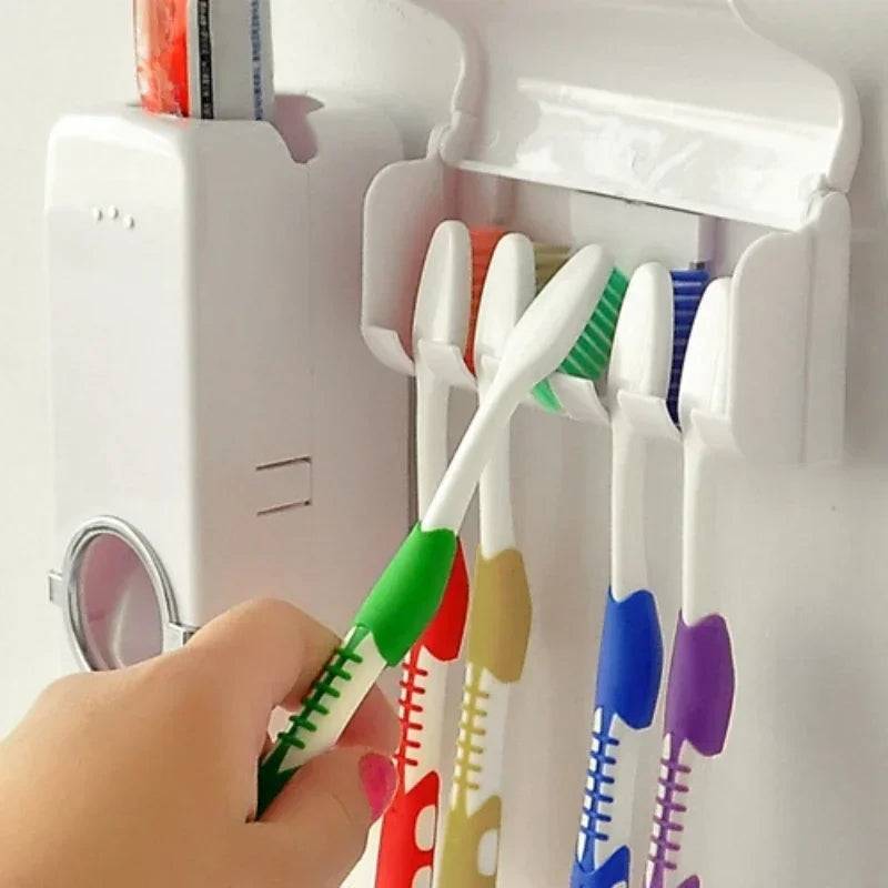 Automatic Toothpaste Dispenser with five-slot toothbrush holder in use, dispensing toothpaste directly onto a toothbrush for a mess-free experience.