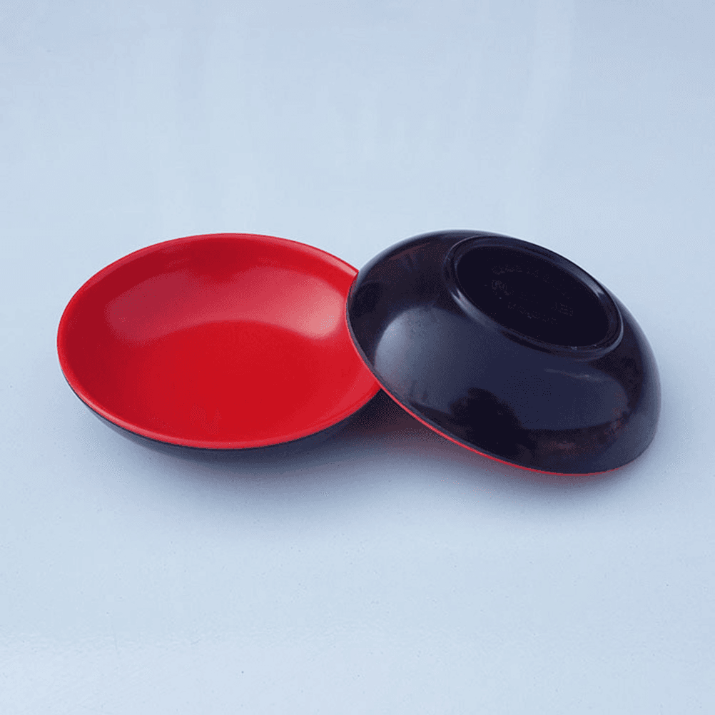 Red and black melamine sauce dishes shown front and back, highlighting scratch-resistant and durable design for everyday kitchen use.