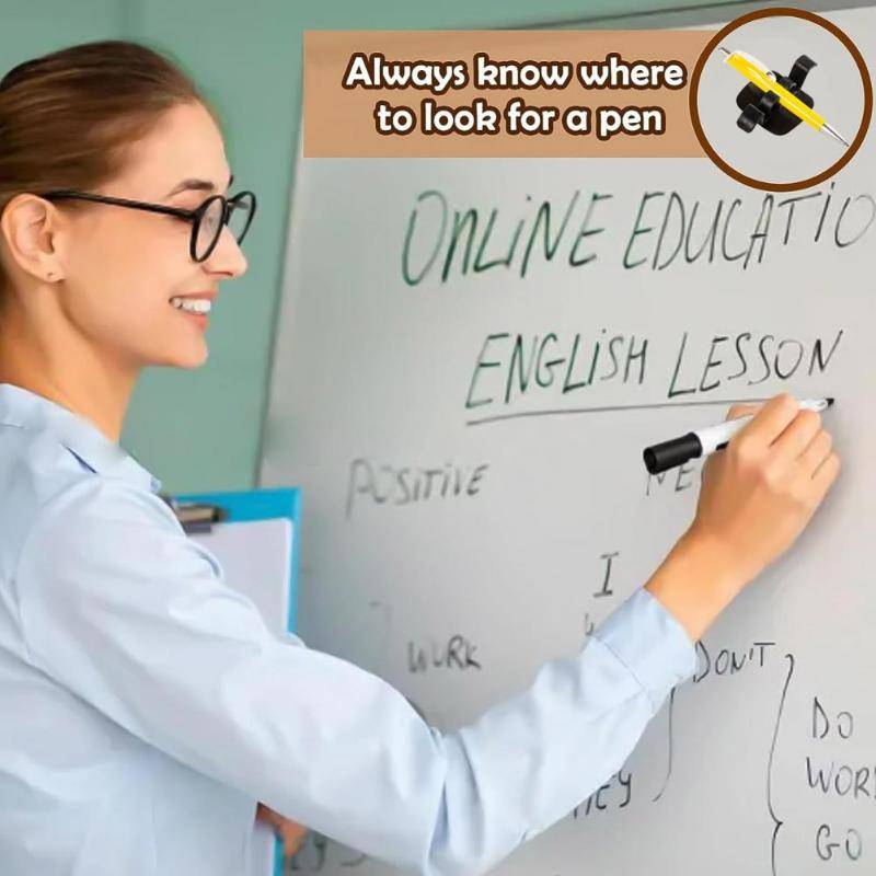 Pen clipped to a black Hole-Free Wire Holder on a whiteboard, showing versatile use for school and office supplies.