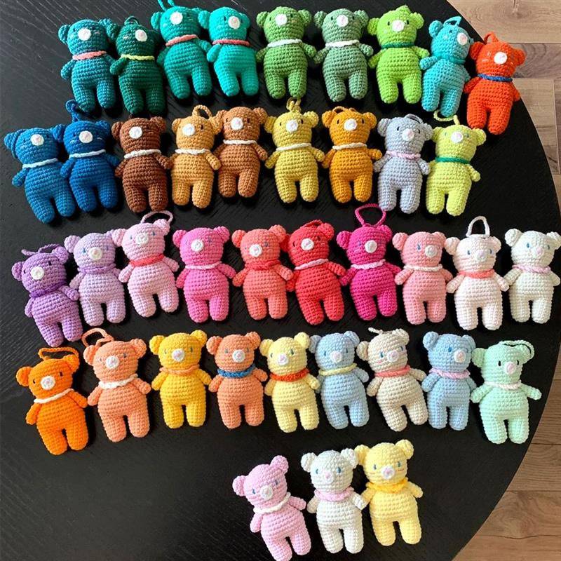 Handmade crochet teddy bears made using Crochet Knitting Yarn 2PCS - 4 Ply Cotton, demonstrating vibrant color variety and texture.