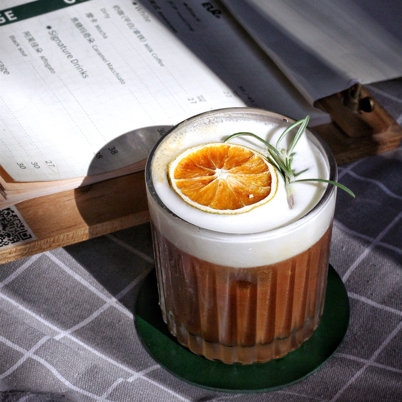335ml stripped whisky bar glass filled with a cocktail garnished with orange slice and rosemary, perfect for stylish drink serving.