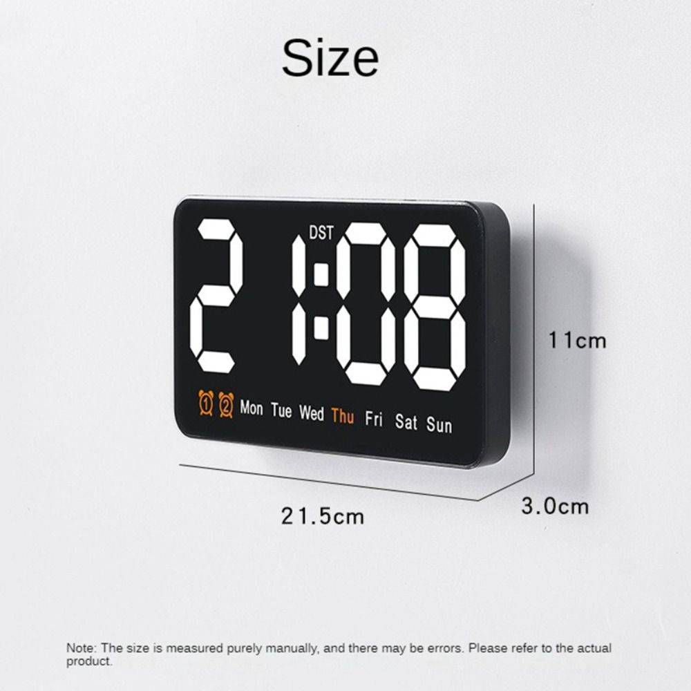 LED Digital Alarm Clock for home with large time display, weekday indicator, and dual alarm icons. USB powered wall clock, 21.5x11x3 cm size.