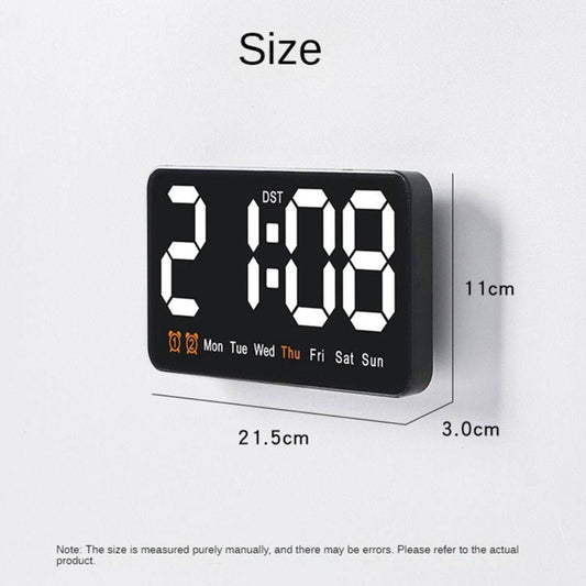LED Digital Alarm Clock for home with large time display, weekday indicator, and dual alarm icons. USB powered wall clock, 21.5x11x3 cm size.