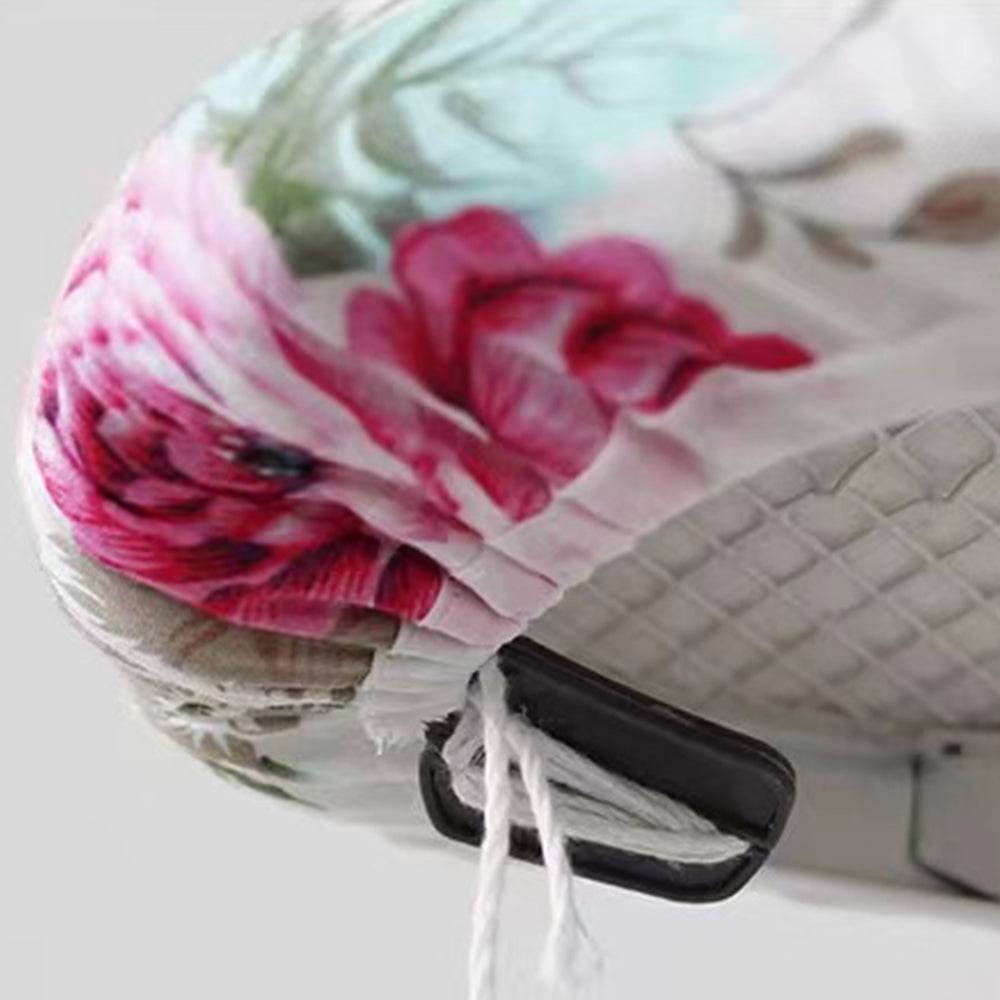 Close-up of floral Ironing Board Fabric Cover with elastic edge and clip, showcasing secure fit from Bamagate.com's Ironing Board Covers collection.