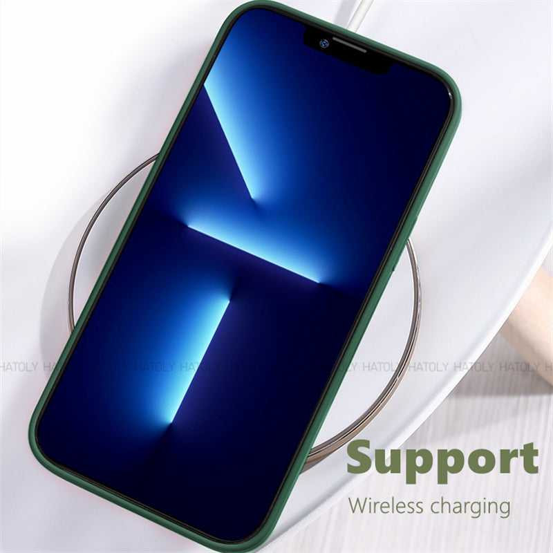 Xiaomi Redmi 13C TPU Back Cover supports wireless charging, shown with phone placed on charging pad in green case.