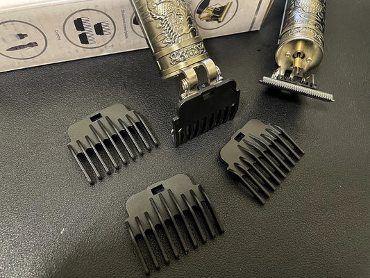 Professional Hair Clipper WS-T789 with ornate metal body and detachable guide combs, ideal for precise grooming and hair trimming.