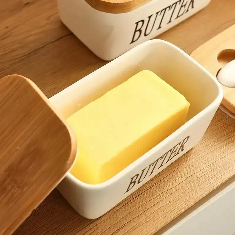 Ceramic butter dish with bamboo lid holding a full butter block. Elegant and functional serveware for kitchen and dining in Sri Lanka.
