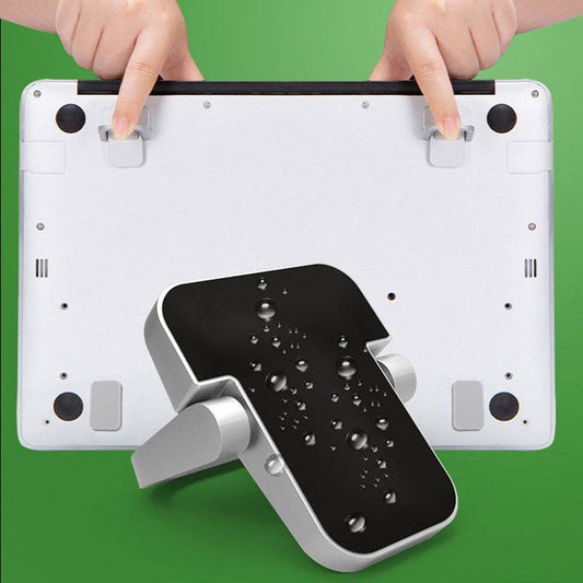 Water-resistant Mini Portable Laptop Stand with adhesive base, shown attached under a laptop, perfect for travel and ergonomic elevation.