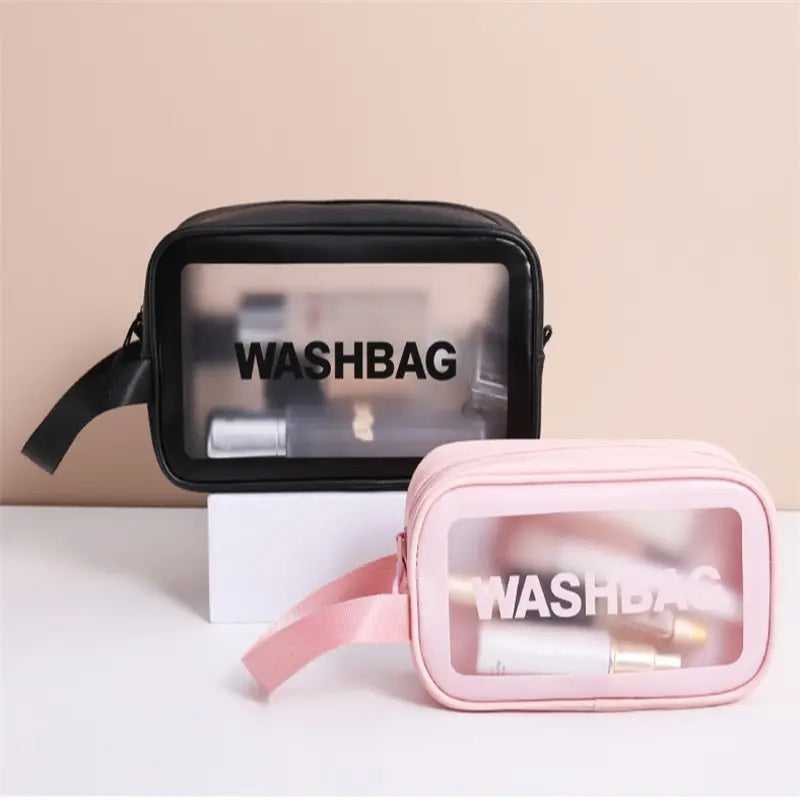 Two-piece Waterproof Travel Makeup Bag Set in black and pink, perfect for storing beauty tools and makeup essentials on the go.