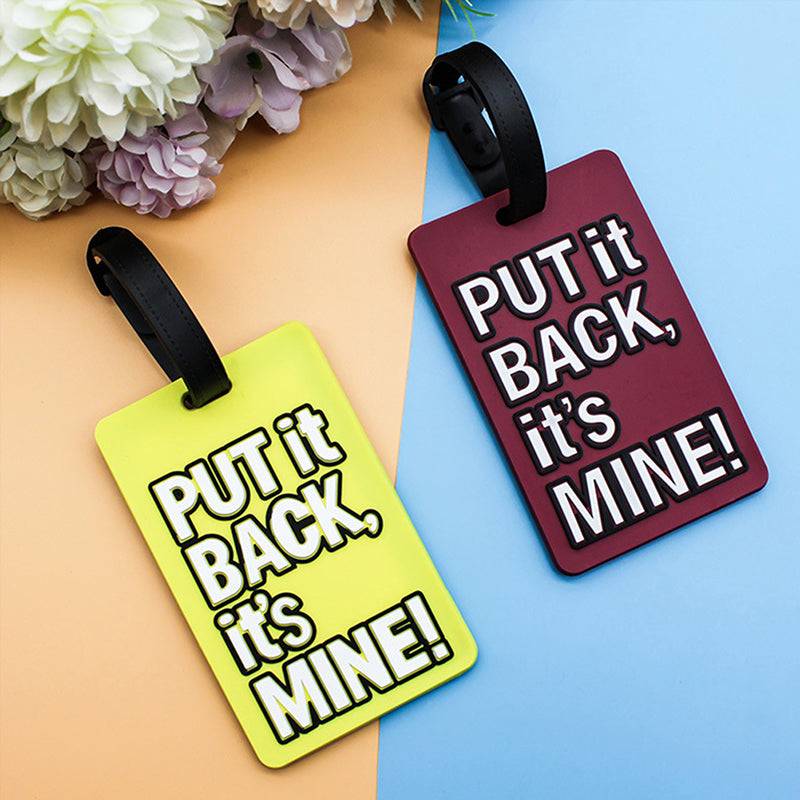 Bright and bold travel luggage tags with 'PUT it BACK, it's MINE!' text for easy identification. Durable silicone design, perfect for travel.