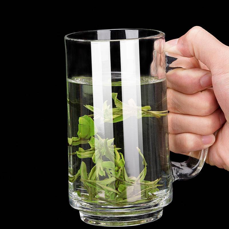 Cool Beer Mug Set - 390ml Beer Mug filled with herbal tea, showcasing clear glass design and sturdy handle, ideal for cold brew or hot drinks.