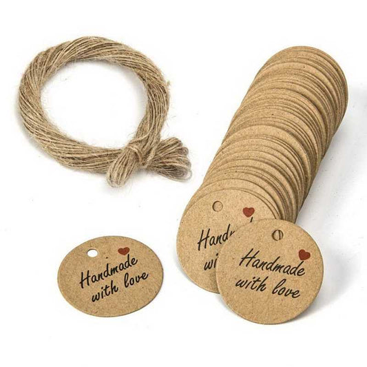 100 PCS Handmade Gift Tags for Special Occasions Sri Lanka featuring round kraft paper tags with 'Handmade with Love' text and jute twine for wrapping.