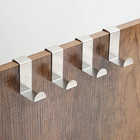 Set of four Drawer Hook Stainless Steel Reversible Price mounted on a wooden drawer, perfect for organizing spaces with durable hanging solutions.