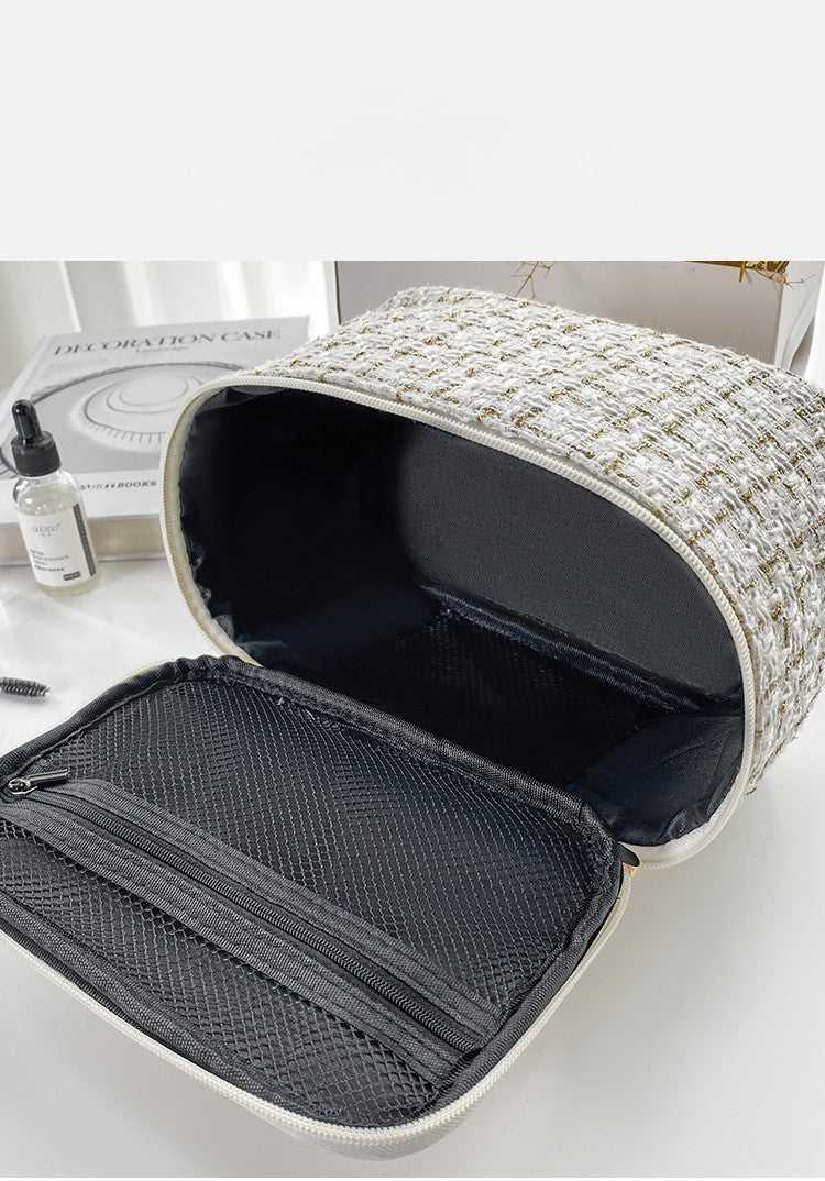 Open view of Large Capacity Cosmetic Makeup Bag for Professionals showing roomy interior and mesh zippered compartment for organized storage.