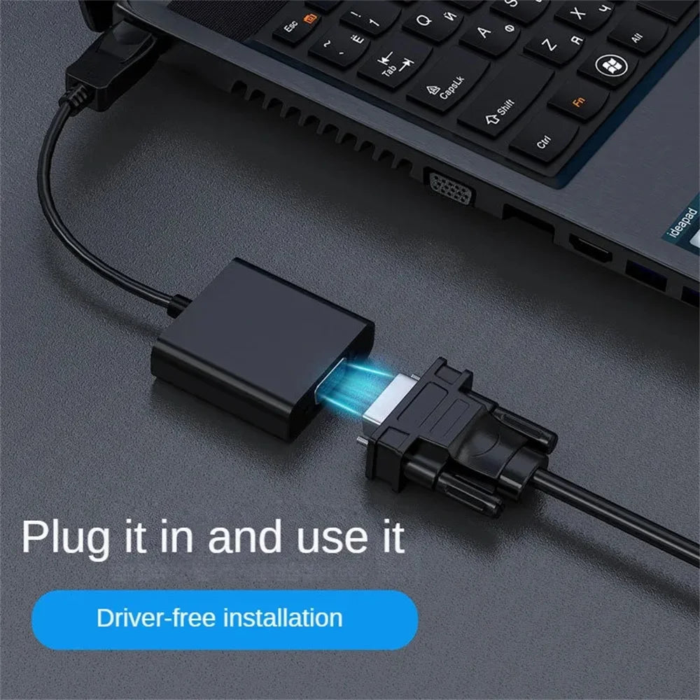 USB 3.0 VGA Converter Adapter plugged into a laptop with VGA cable, highlighting driver-free installation for seamless display connection.
