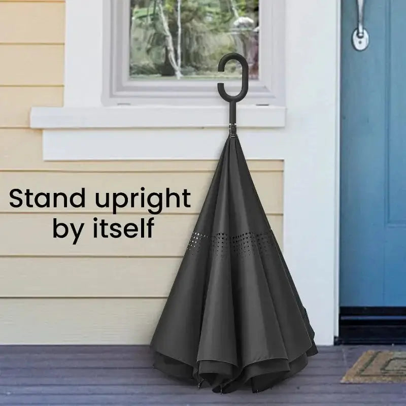 Self-standing reverse folding umbrella with a C-shaped handle, designed for hands-free use and easy storage in home or office spaces.