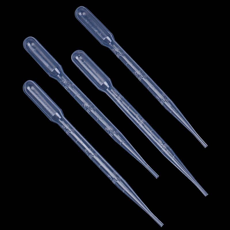 Set of four 3ml plastic painting droppers on black background, ideal for precise paint dispensing in art and craft kits.