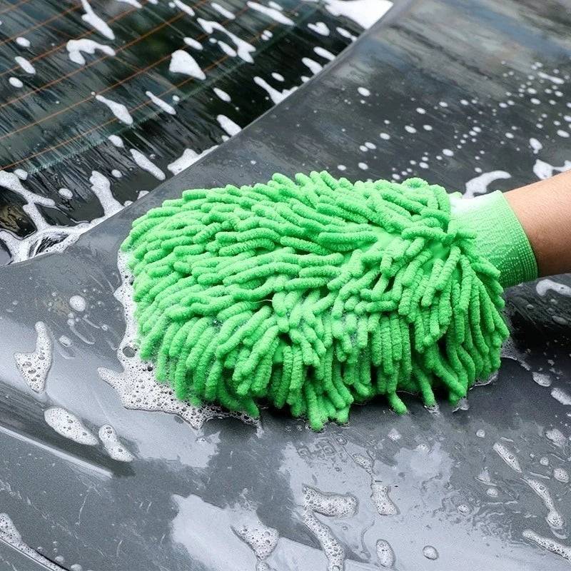 Green car wash gloves scrubbing a car with soap suds. Waterproof design with textured microfiber for deep cleaning and hand protection.