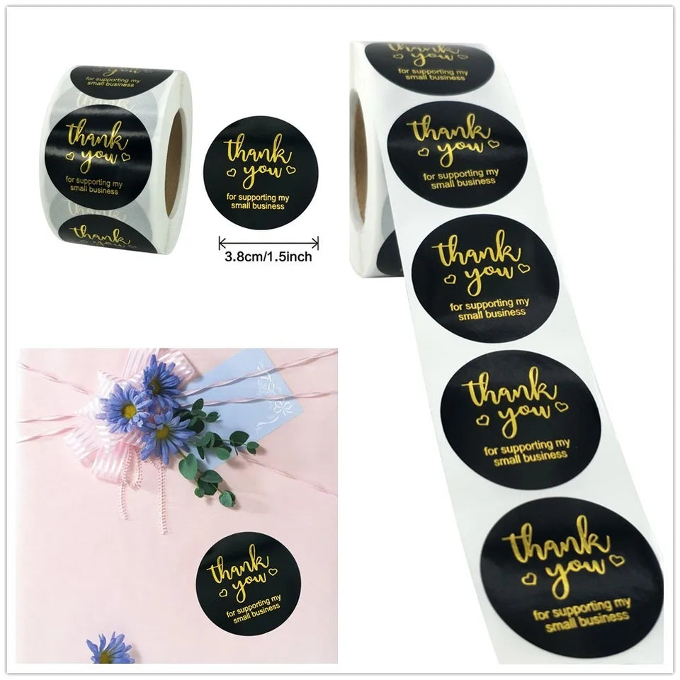 500 PCS Thank You Stickers Label roll, 1.5-inch black round tags with gold text, perfect for small business packaging and gift wrapping.