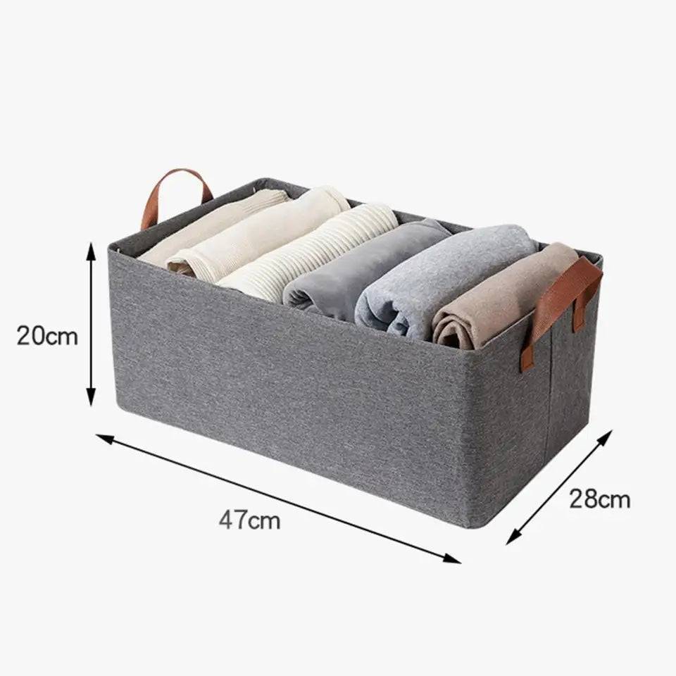 Wardrobe Cloth Storage Organiser dimensions 47x28x20cm, made from nonwoven fabric with leather handles for easy carrying.