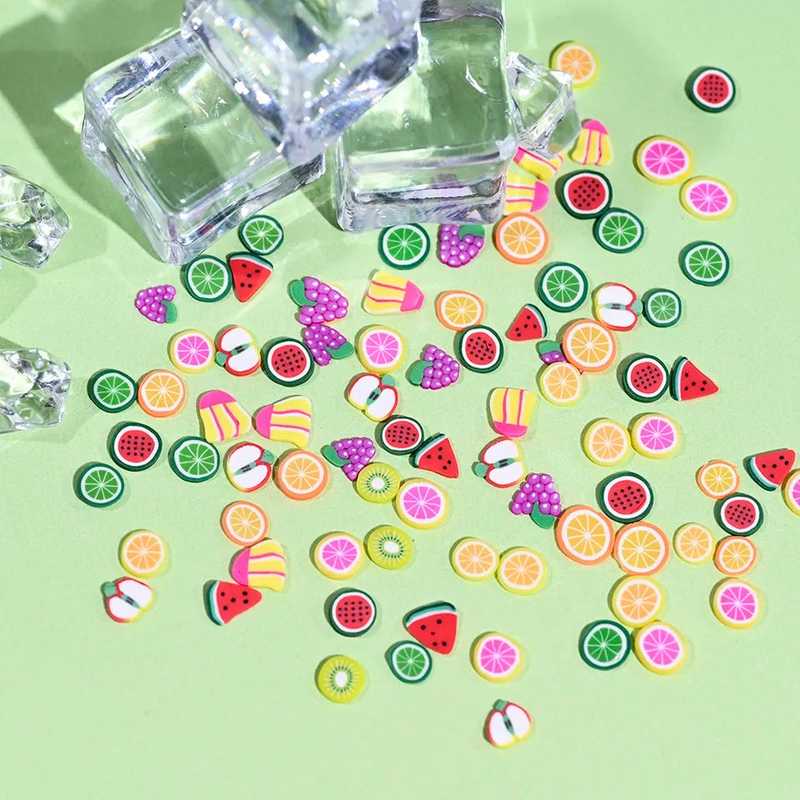 Colorful Polymer Clay Beads Fruit - Fruit Shape Beads for DIY jewelry making and scrapbooking, displayed on green surface with ice cubes.