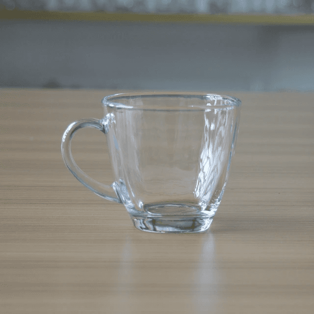 Clear empty glass tea cup from the 6 Cups Glass Tea Set. Durable, heat-resistant drinkware perfect for modern kitchen and dining use.