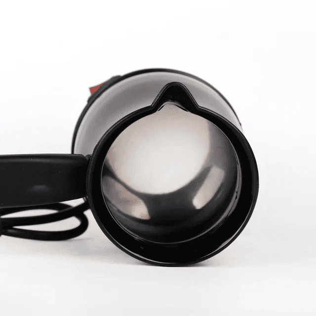 Top view of Su Tai Electric Coffee Pot showing stainless steel interior, designed for efficient and quick coffee preparation at home.