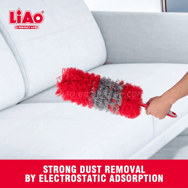 LIAO Microfiber Duster - Handhold used on a white sofa for efficient dust removal with electrostatic adsorption. Ideal for household cleaning tasks.