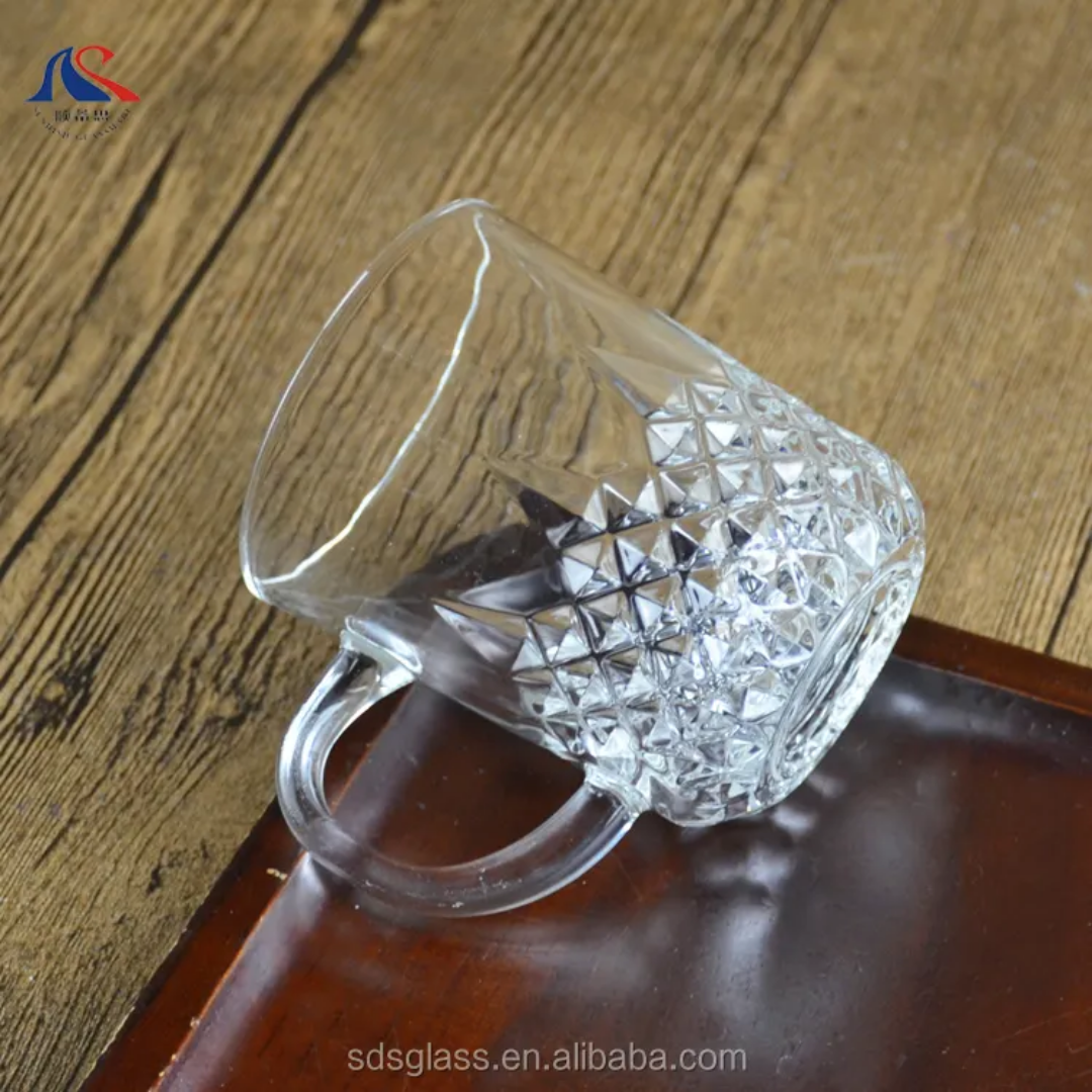 Single clear 240ml tea cup from the Diamond Cut Tea Cup Set, highlighting the textured diamond design, perfect for elegant tea presentations.