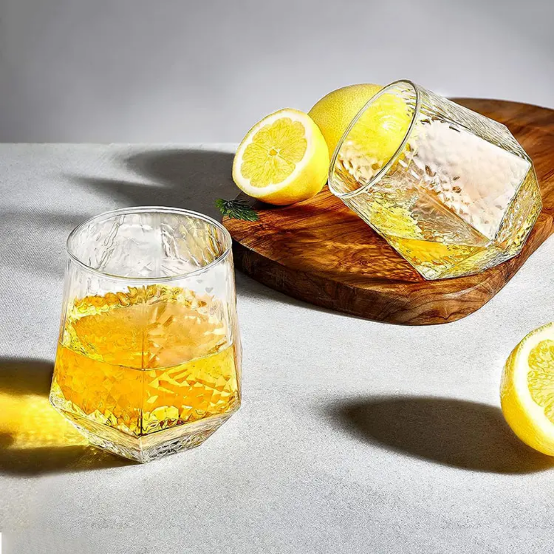 Hammered Diamond Whiskey Glasses with citrus drink on wooden board, elegant drinkware for kitchen and dining in Sri Lanka.