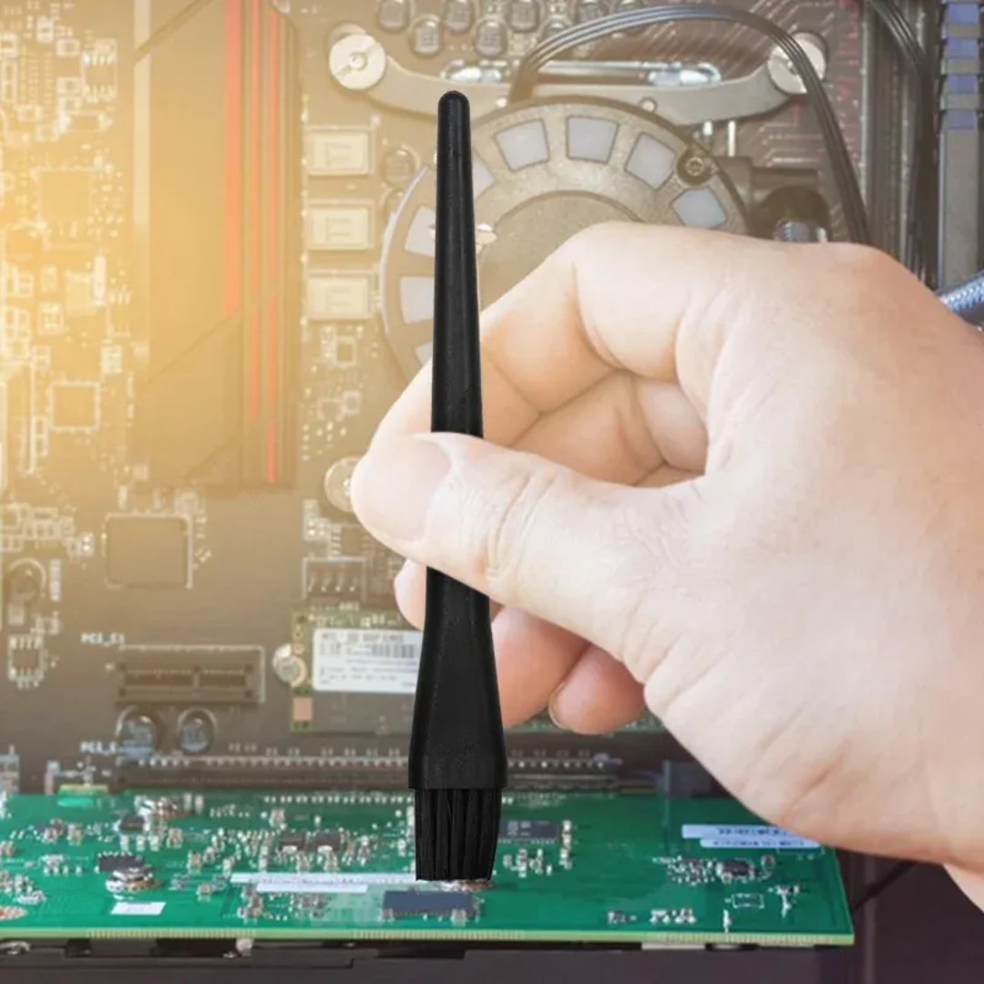 Mini Anti-Static PCB Tool Cleaning Brush cleaning a green motherboard inside a computer case, perfect for static-sensitive electronics | Bamagate.com