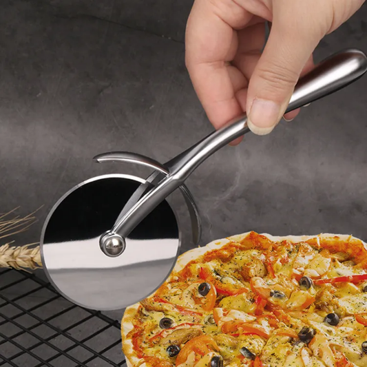 Hand using stainless steel pizza cutter to slice a loaded pizza. Sharp blade cuts through crust effortlessly. Buy Pizza Tools Online in Sri Lanka.