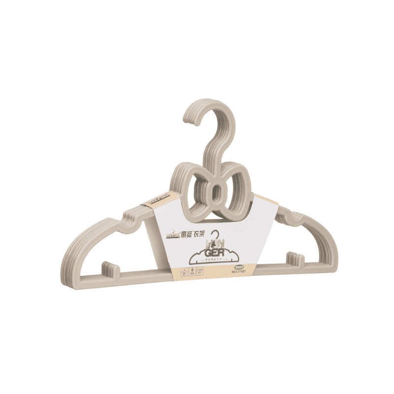 Beige baby clothes plastic hanger from 5PCS set with bow design, ideal for organizing newborn to toddler outfits in slim closet spaces.