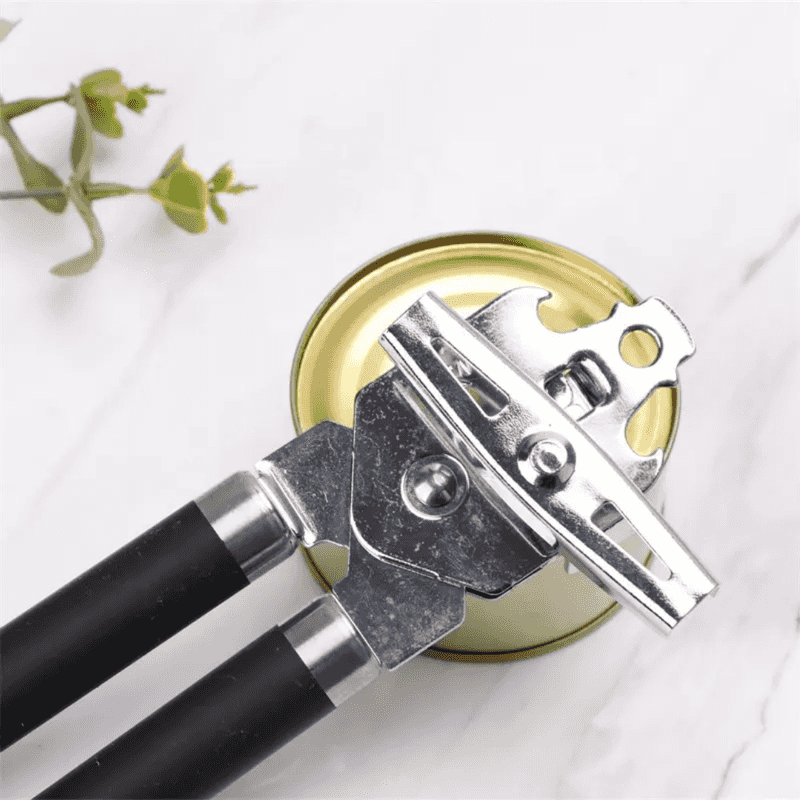 Classic Multifunction Can Opener for Kitchen in use on a tin can, showing precise cutting mechanism and durable stainless steel construction.