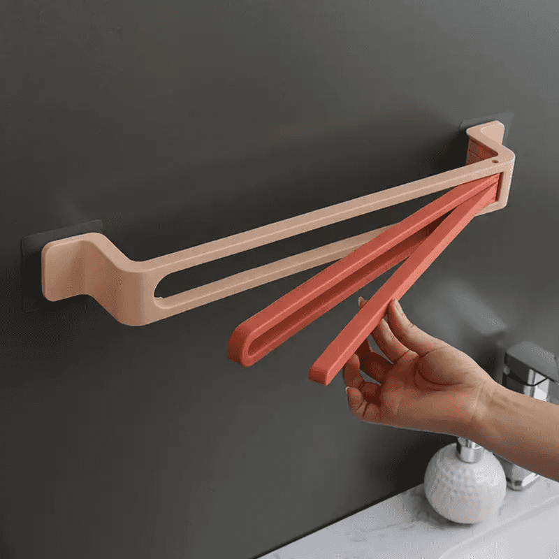 Wall-mounted Nail Free Bathroom Towel Holder with rotating arms for flexible towel hanging, enhancing bathroom space efficiency.