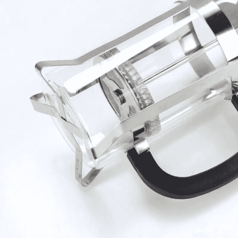 850ml French Press Coffee Maker with borosilicate glass and stainless steel frame, shown from a side angle highlighting its durable design.
