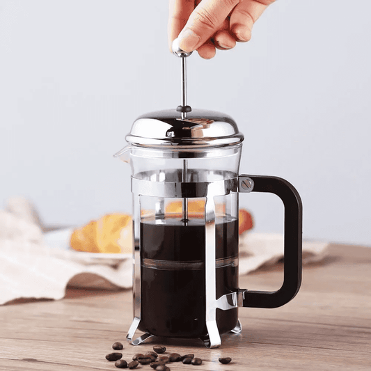 600ml Stainless Steel Coffee Maker with plunger in action, perfect for brewing fresh coffee in any Kitchen & Dining setup in Sri Lanka.