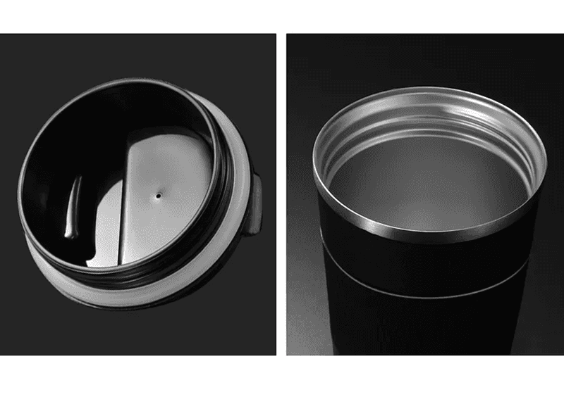 Detailed view of the black travel mug lid and stainless steel rim, highlighting the secure seal and insulation design.
