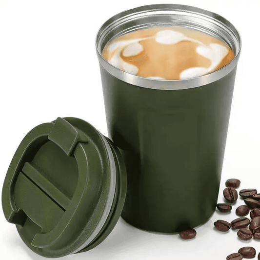 Green 500ml insulated stainless steel travel mug filled with coffee, shown with removable lid and coffee beans beside it.