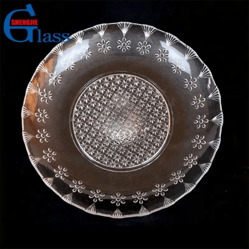 Top view of decorative 12-inch glass serving plate with textured center and floral rim, perfect for kitchen and dining serveware collections.