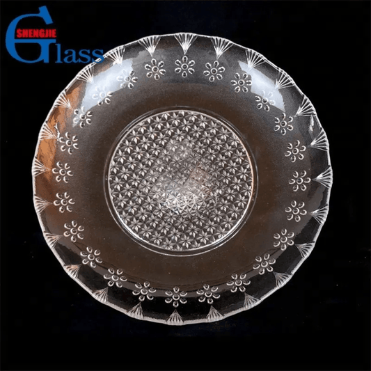 Top view of decorative 12-inch glass serving plate with textured center and floral rim, perfect for kitchen and dining serveware collections.
