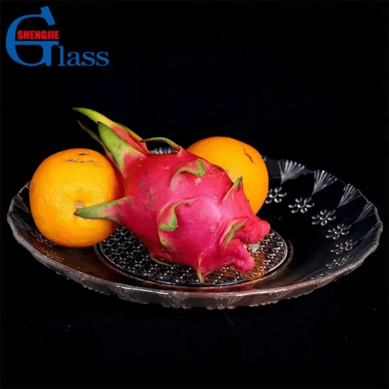 Glass serving tray with dragon fruit and oranges, showcasing 12-inch crystal plate for stylish fruit presentation. Buy at Bamgate.com in Sri Lanka.