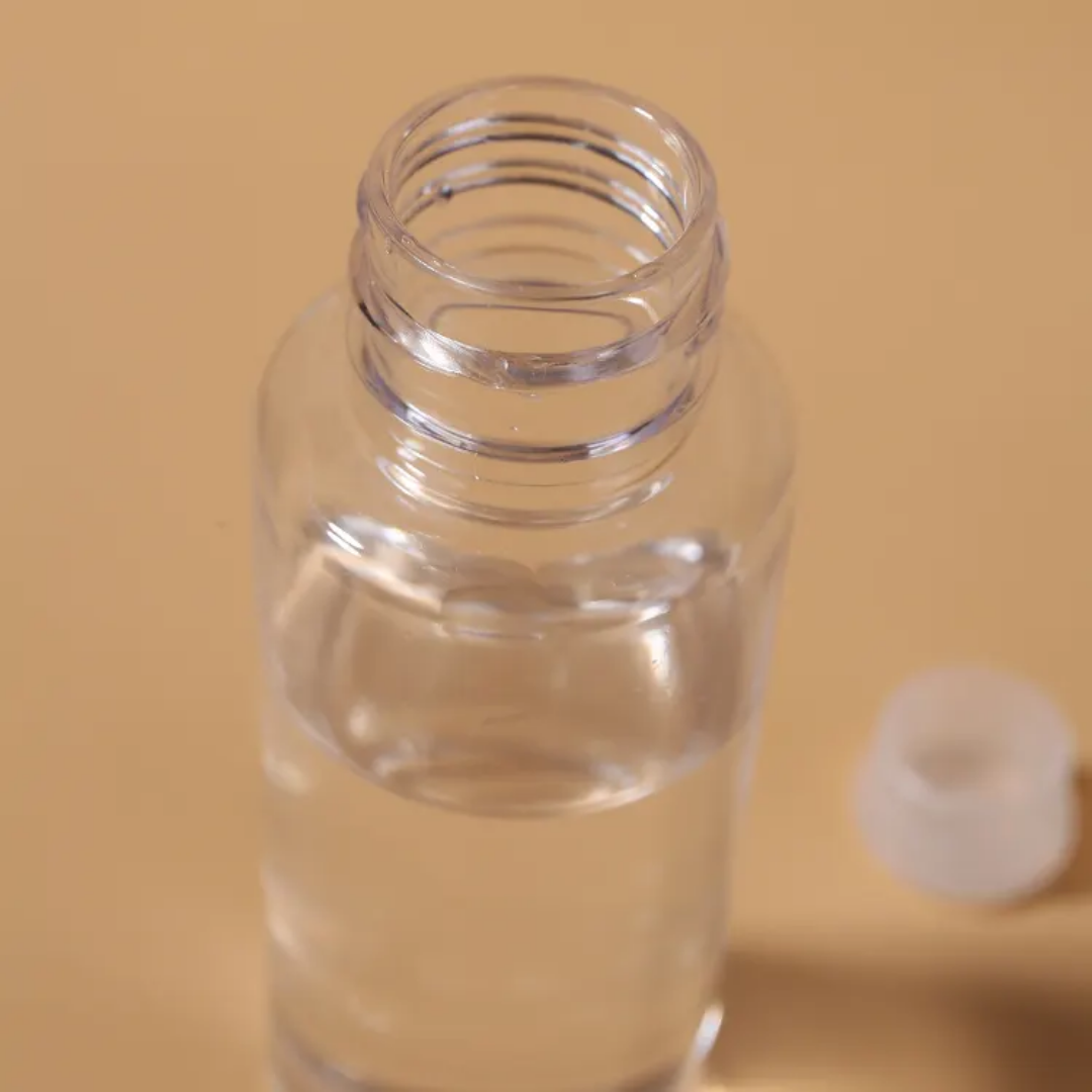 Open transparent travel bottle from the 6PCS Mini Refill Bottles kit, perfect for storing liquids like toner or shampoo | Price Sri Lanka