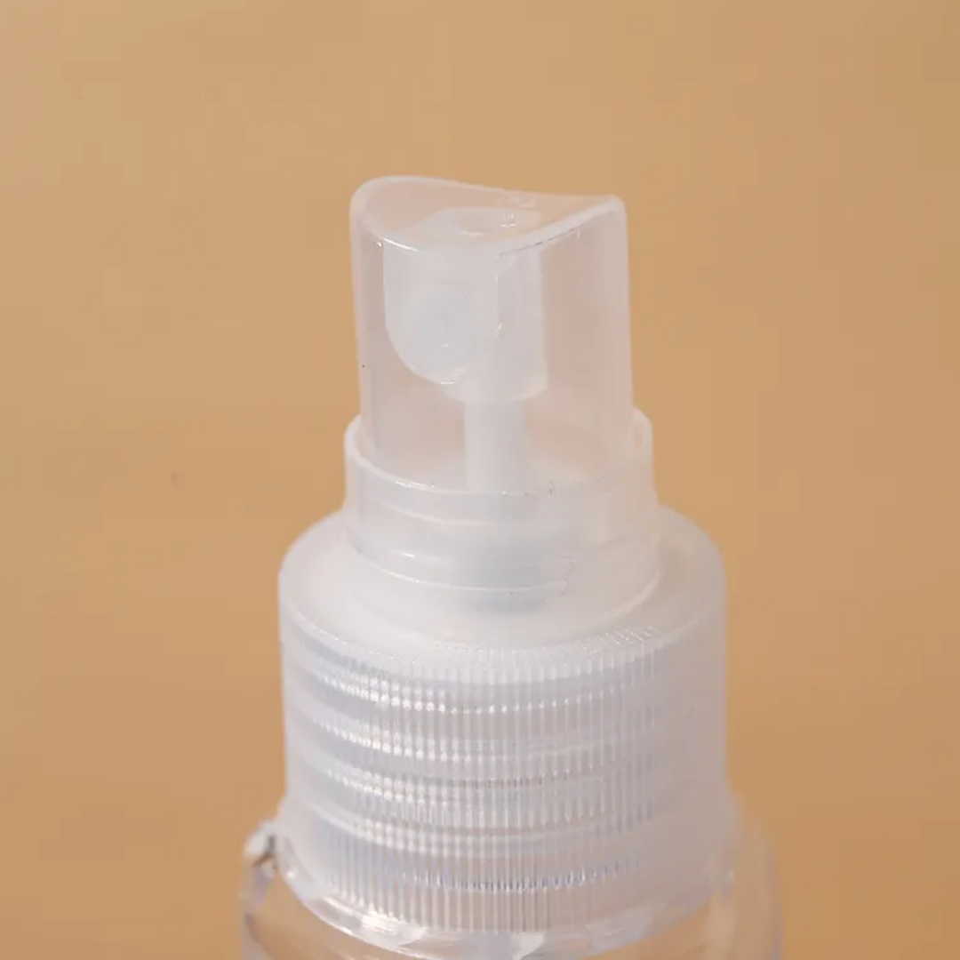 Close-up of a transparent spray nozzle from the 6PCS Mini Refill Bottles set, ideal for misting liquids during travel | Price Sri Lanka