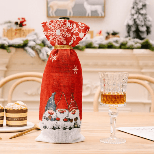 Reusable Christmas Wine Bottle Bag featuring red fabric with snowflake and gnome design, perfect for elegant holiday wine gift wrapping.