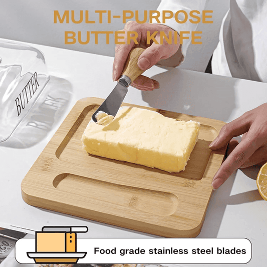 Multi-purpose butter knife spreading butter on bamboo base of the butter holder. Features food-grade stainless steel blade for safe kitchen use.