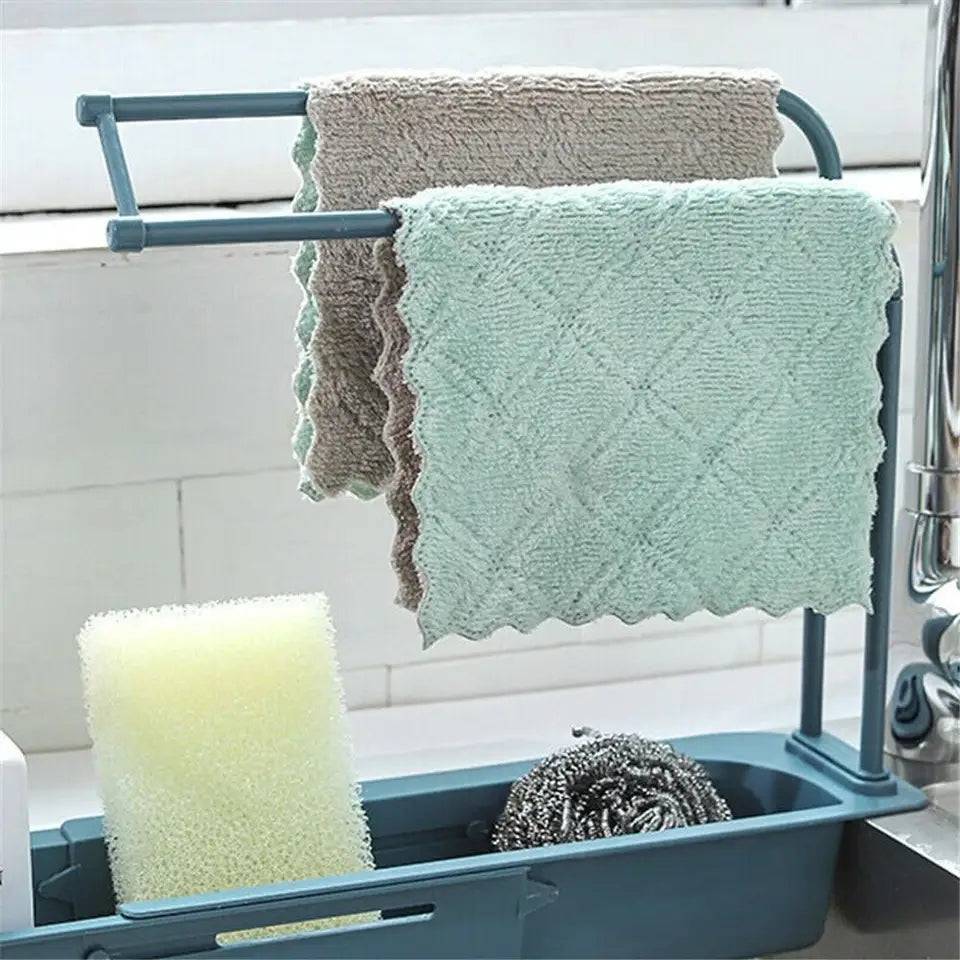 Durable Kitchen Sink Shelf Organizer with towel bars and compartments for soap dispensers and scrubbers to keep your sink area tidy.